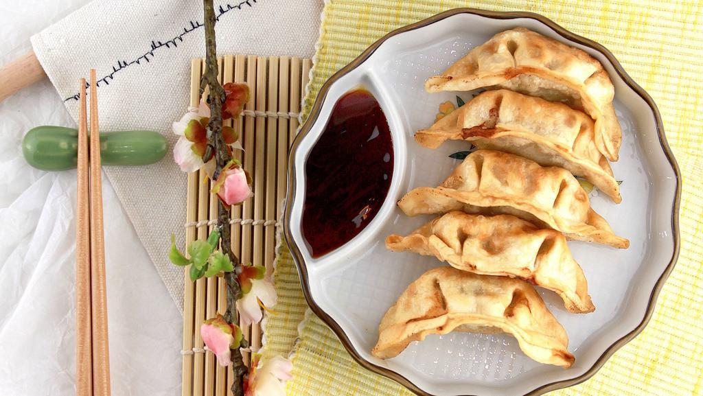 Gyoza (5 Pieces) · Pork and vegetable potstickers.
