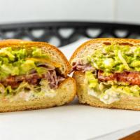 EL CHAVO · avocado, deluxe ham & american cheese with mayo, lettuce, tomato & hot pepper sauce on frenc...