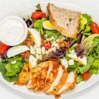 Cobb Salad · Made the traditional way with chicken breast, endive, cherry, tomatoes, bacon, hard boiled e...