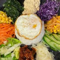 Bibimbap Topped With Spicy Chicken · Steamed white rice topped with seasonal veggies and korean chili paste with spicy chicken to...