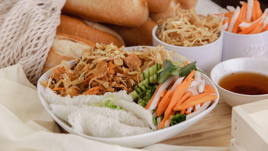 Vegan Vermicelli Bowl · Bánh Hỏi Bì Chay: Mixed shredded tofu, yams, taro, mushrooms, carrots, and jicama with rice-vermicelli noodles, chopped lettuce, crispy fried onions, sweet pickled carrots & Daikons, cilantro, jalapenõs, sweet & savory vegan Vietnamese 