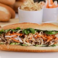 Shredded Chicken Bánh Mì · Baguette Bánh Mì Gà: Shredded light and dark meat chicken, crispy fried onions, sweet pickle...