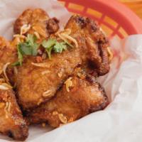 8 pcs Vietnamese Chicken Wings · Cánh Gà Chiên Nước Mắm: 8 pieces of fried chicken wings tossed in a sweet & savory light fis...