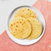 Papadam · Thin Indian cracker or flatbread served as a side.