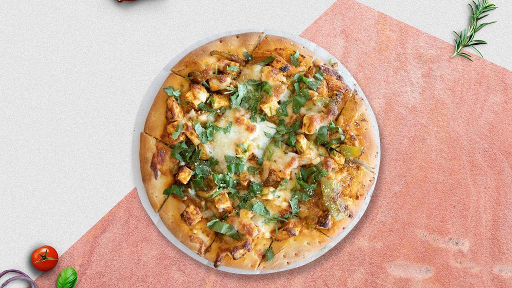 Chicken Tikka Masala Specialty Pizza · Tandoori chicken, creamy tikka masala sauce, onions, bell peppers, mushrooms baked on a hand-tossed dough.
