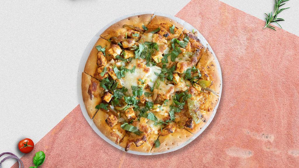 Chicken Spinach Specialty Pizza · Chicken, bell peppers, mushrooms, spinach, garlic, ginger, and onions baked on a hand-tossed dough.