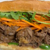 BBQ Beef Banh Mi · BBQ beef, pickled carrot, cilantro, scallion, jalapeños, chilli paste, mayonnaise, and soy s...