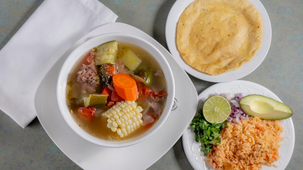 Caldo de Res · Delicious and popular beef soup served with your choice of flour or corn tortillas.
