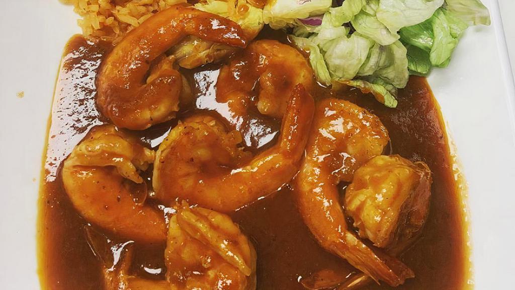 Camarones a La Diabla · Spicy shrimp.