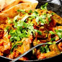 Kadai Bhindi (VEGAN) · Gluten- Free. Vegetarian. Crispy fresh fried cut okra, onion, tomatoes, lime and mango powder.