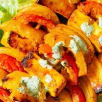 Paneer Tikka (8 Cubes) · Gluten- Free. Cottage cheese marinated in hung yogurt and spices skewered in clay oven.