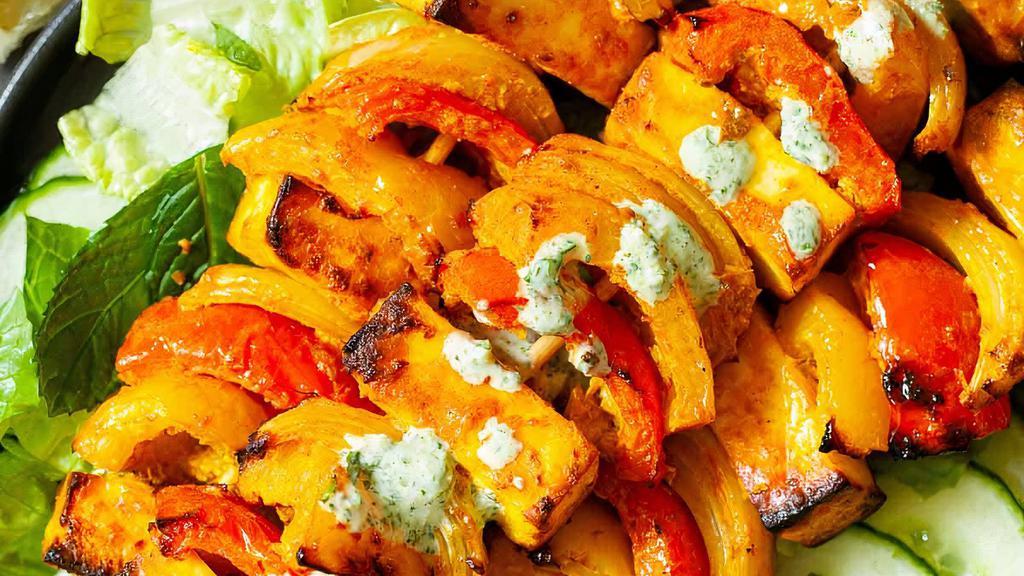 Paneer Tikka (8 Cubes) · Gluten- Free. Cottage cheese marinated in hung yogurt and spices skewered in clay oven.