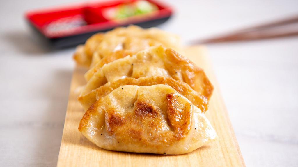 The Impossible Potsticker · Gluten-free potstickers filled with Impossible Beef, fresh garlic, and fresh ginger. Pan fried and served with our house-made ginger garlic sauce. 5 per order. (Gluten-Free & vegan)