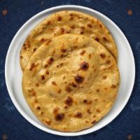 Holy Roti · Our famous Thai style pan toasted roti flat bread served with flavorful dipping sauce and a ...
