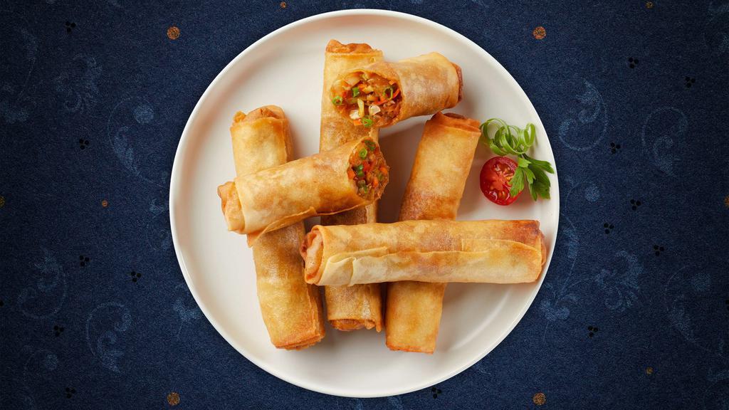 Rock N' Spring Roll · Deep-fried wrapped rice paper rolls stuffed with vegetables and bean thread noodles (clear noodles) served piping hot with plum sauce.