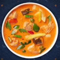 Panang Curry · Mild red curry sauce and coconut milk with tofu, broccoli, zucchini, carrots, bell peppers a...