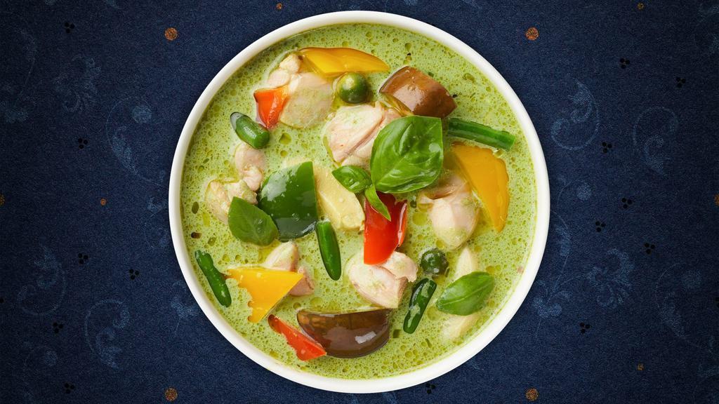 Green Curry · Green curry sauce and coconut milk with tofu, eggplants or bamboo shoots, bell peppers, and sweet basil.