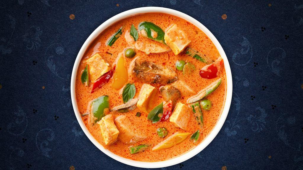 Red Curry · Red curry sauce and coconut milk with tofu, eggplants or bamboo shoots, bell peppers, and sweet basil.