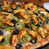 Chilly Paneer · Shahi paneer sauce, bell peppers, red onions, tomatoes, masala paneer, green onions, jalapen...