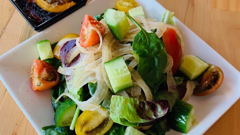 Seasonal Salad · Salad with house-made citrus dressing (spring mix, cucumber, cherry tomato, sliced onion)