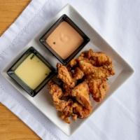 Chicken Karaage · Japanese-style crispy fried chicken served with mustard and spicy mayo.
