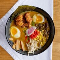 Chicken Curry · Chicken broth with creamy miso base topped with sauteed chicken, corn, bean sprout, green on...