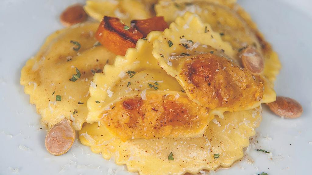 Pumpkin Ravioli · Pumpkin and butternut squash puree blended with Parmesan and mascarpone cheeses and brown sugar.

Served with Breadsticks and Cheesespread