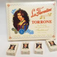 La Florentine Torrone · 18pc 
An assortment of orange, lemon and vanilla soft almond nougats