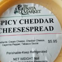 8oz Spicy Cheddar Cheesespread · Our Famous Cheesespread that compliments our Breadsticks
