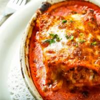Meat Lasagna · Pasta Sheets layered with Bolognese Sauce, Ricotta & Mozzarella Cheese