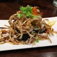 Paradise · Unagi tempura, avocado, crab and fried onion on top.