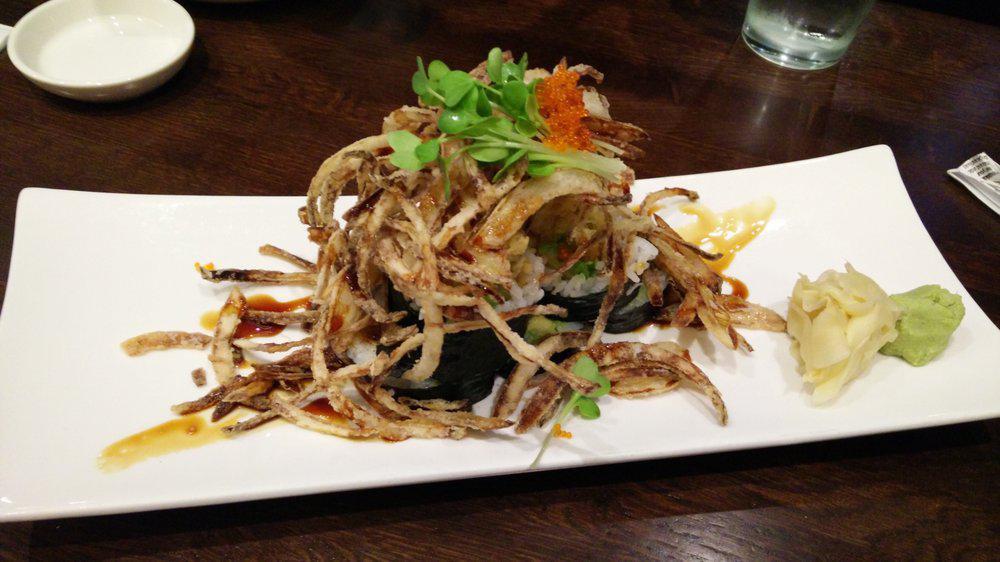 Paradise · Unagi tempura, avocado, crab and fried onion on top.