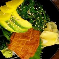 Vegetable Chirashi Donburi · Avocado, cucumber, shitake, pickle, spinach, seaweed salad and inari.
