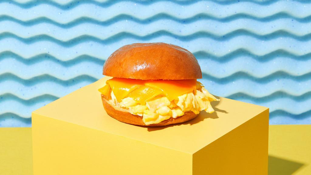 Egg and Cheese · A fried egg and your choice of cheese on a brioche bun.
