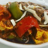 Kadai Paneer · Indian cottage cheese (paneer) cooked in onion tomato gravy with bell peppers and spices