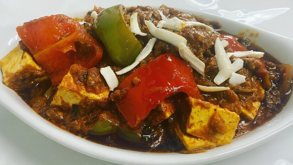 Kadai Paneer · Indian cottage cheese (paneer) cooked in onion tomato gravy with bell peppers and spices