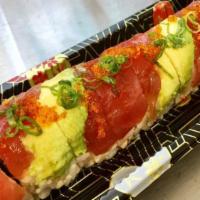 Crazy Roll · Spicy salmon, cucumber topped with avocado, tuna, eel sauce, sesame seed, green onion, and t...