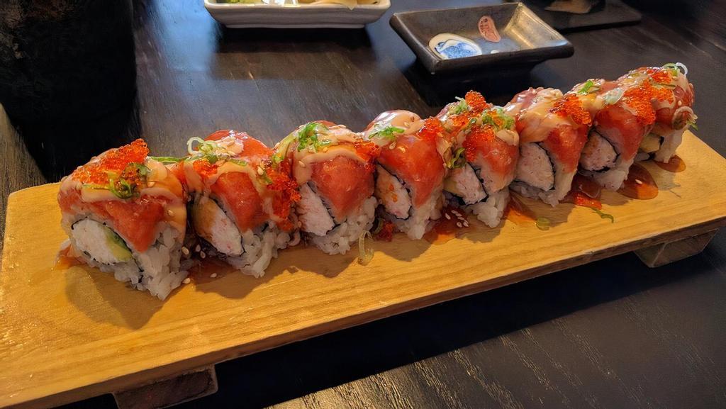 R.Y. Roll · Imitation crab, avocado, cucumber topped with spicy tuna, spicy mayo sauce, eel sauce, tobiko, sesame seed, and green onion,