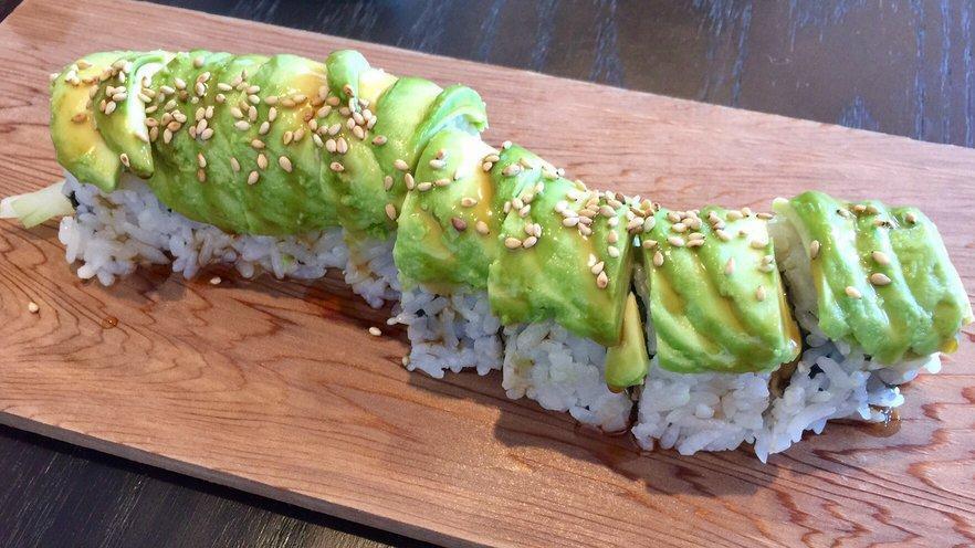 Caterpillar Roll · Eel, cucumber topped with avocado, eel sauce, and sesame seed