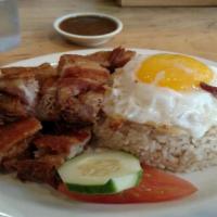 Lechonsilog · Lechonsilog is a short term for Lechon (Roasted Pig), sinangag (fried rice) and pritong itlo...