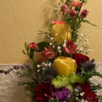 Hand tied Bouquet · A fabulous hand tied bouquet with fresh seasonal cut flowers.    This arrangement is ready m...