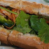 M1 - Grilled Chicken Sandwich · With Vietnam mayonnaise, jalapenos, cilantro, fresh cucumber, papaya, and carrot pickle.