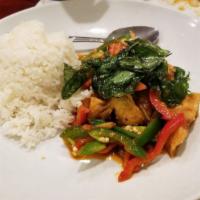 Thai Wild Ginger Catfish · Sautéed catfish with Prik-gang paste, wild ginger, bell pepper, and jalapeno topped with cru...