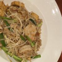 Pad Thai · Thai famous pan-fried rice noodle choice of chicken or prawns or veggie, tofu, egg, chopped ...