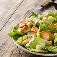 Caesar Salad · Fresh crispy romaine lettuce topped with parmesan cheese, crunchy croutons and Caesar dressi...