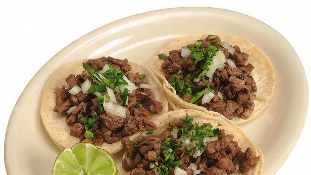 3 TACOS · Corn tortillas topped with meat, onions, cilantro and salsa