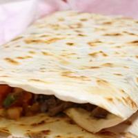 QUESADILLA SUIZA · Vegetarian. Grilled flour tortilla with melted cheese, meat, sour cream, guacamole, and salsa.