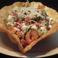 TACO SALAD · Vegetarian. Flour tortilla bowl filled with meat, whole pinto beans, rice, lettuce, cheese, ...