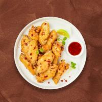 My Sweety Chili Wings · Fresh chicken wings breaded, fried until golden brown, and tossed in sweet chili sauce. Serv...
