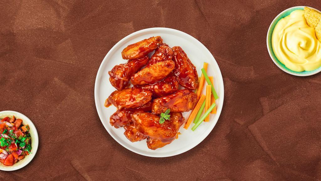 Buffalo Blaze Wings · Fresh chicken wings breaded, fried until golden brown, and tossed in buffalo sauce. Served with a side of hot honey or bleu cheese.